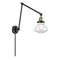 Olean Swing Arm shown in the Black Antique Brass finish with a Clear shade