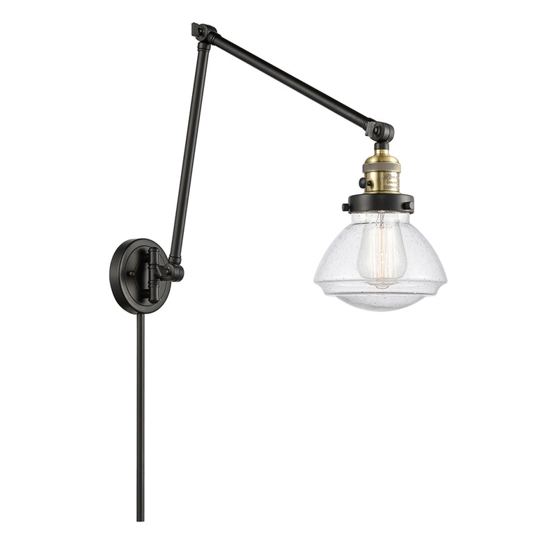 Olean Swing Arm shown in the Black Antique Brass finish with a Seedy shade