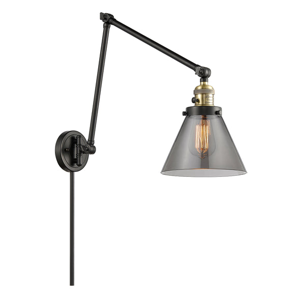 Cone Swing Arm shown in the Black Antique Brass finish with a Plated Smoke shade