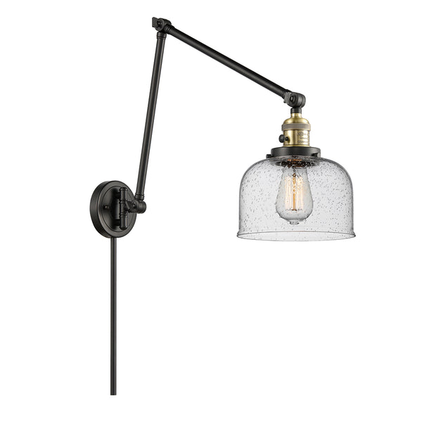 Bell Swing Arm shown in the Black Antique Brass finish with a Seedy shade