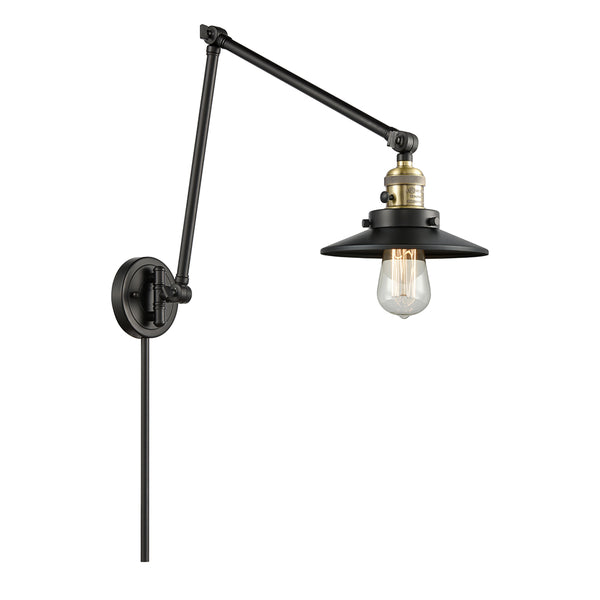 Railroad Swing Arm shown in the Black Antique Brass finish with a Matte Black shade