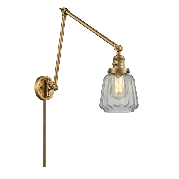 Chatham Swing Arm shown in the Brushed Brass finish with a Clear shade