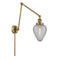 Geneseo Swing Arm shown in the Brushed Brass finish with a Clear Crackled shade