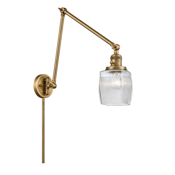 Colton Swing Arm shown in the Brushed Brass finish with a Clear Halophane shade