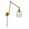 Colton Swing Arm shown in the Brushed Brass finish with a Clear Halophane shade