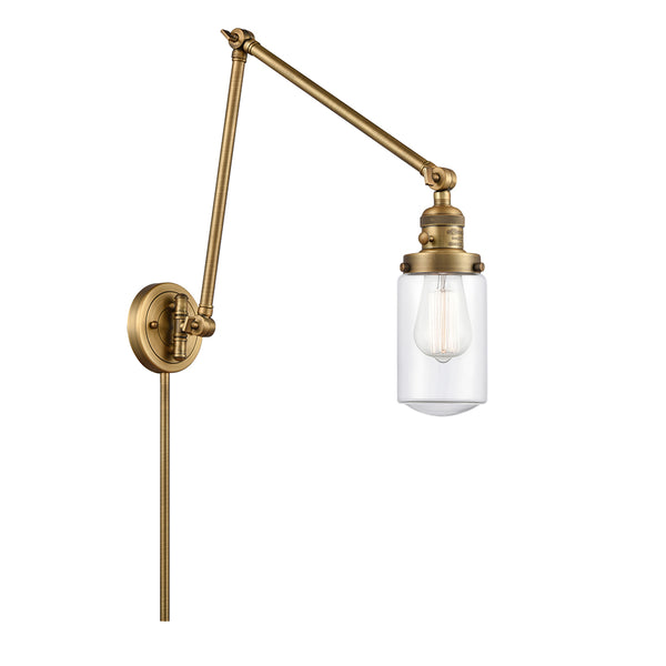 Dover Swing Arm shown in the Brushed Brass finish with a Clear shade