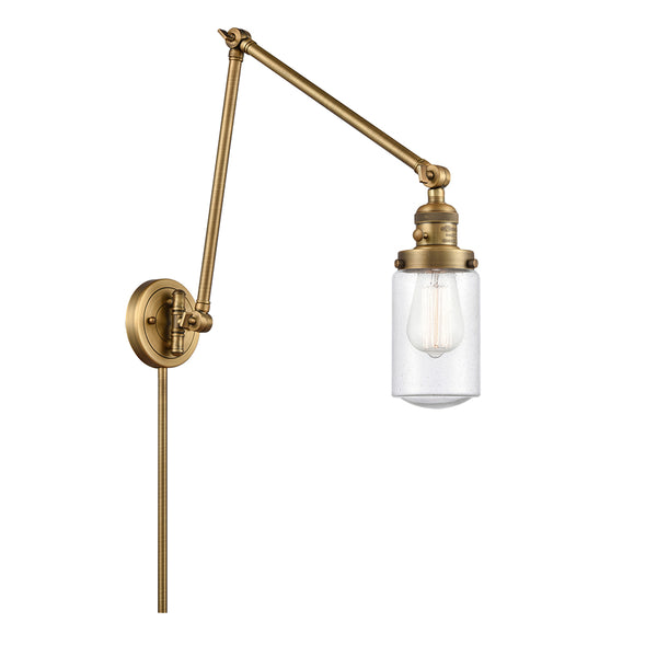 Dover Swing Arm shown in the Brushed Brass finish with a Seedy shade