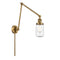Dover Swing Arm shown in the Brushed Brass finish with a Seedy shade