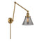 Cone Swing Arm shown in the Brushed Brass finish with a Plated Smoke shade
