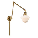 Oxford Swing Arm shown in the Brushed Brass finish with a Matte White shade
