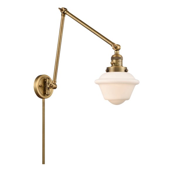 Oxford Swing Arm shown in the Brushed Brass finish with a Matte White shade