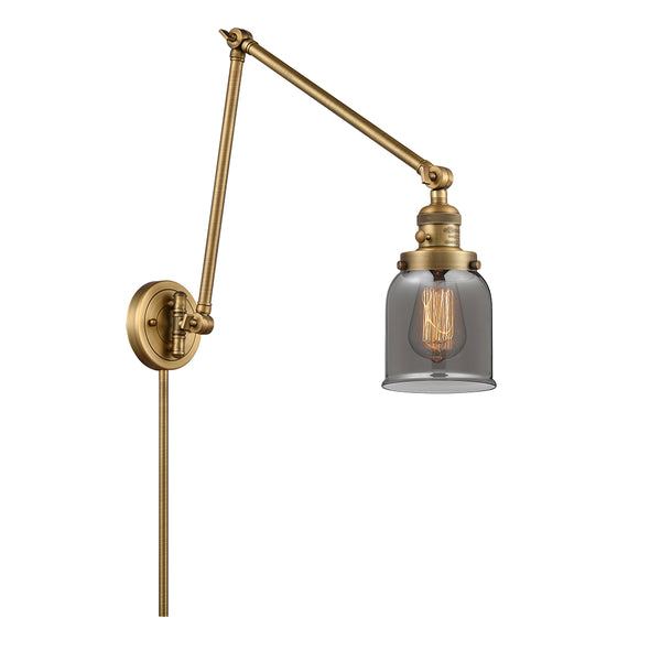 Bell Swing Arm shown in the Brushed Brass finish with a Plated Smoke shade