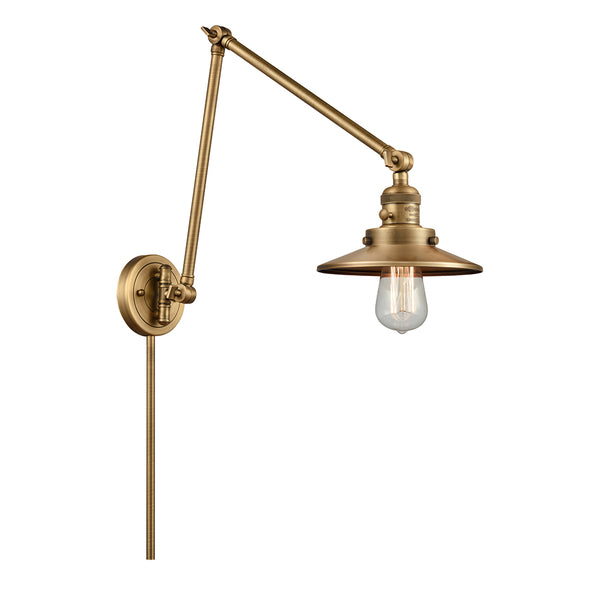 Railroad Swing Arm shown in the Brushed Brass finish with a Brushed Brass shade