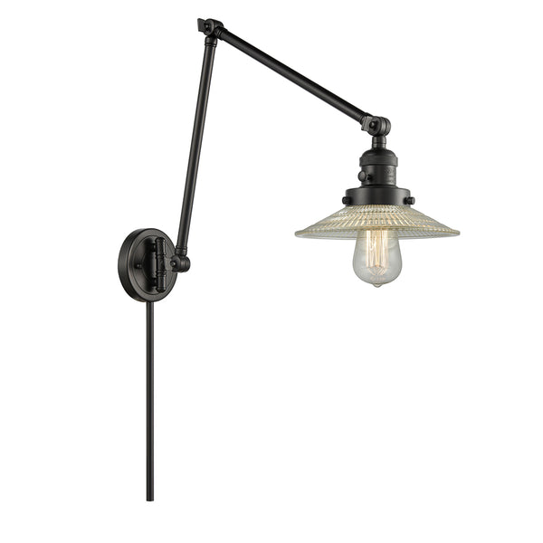 Halophane Swing Arm shown in the Matte Black finish with a Clear Halophane shade