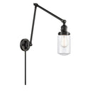 Dover Swing Arm shown in the Matte Black finish with a Clear shade
