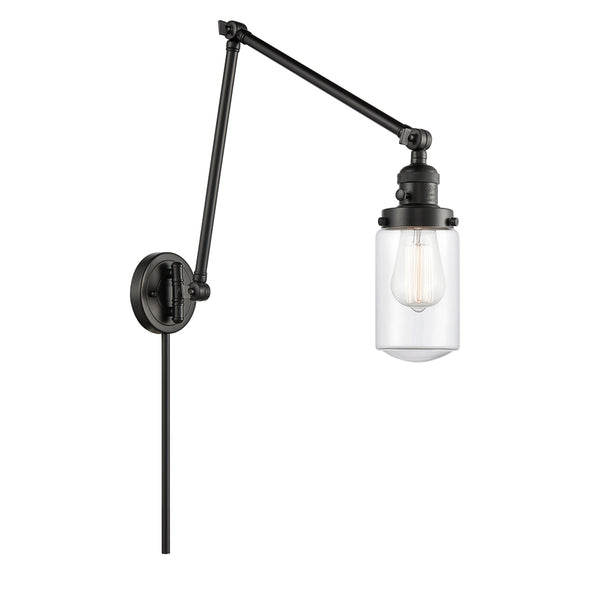 Dover Swing Arm shown in the Matte Black finish with a Clear shade