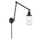 Dover Swing Arm shown in the Matte Black finish with a Clear shade