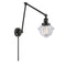Oxford Swing Arm shown in the Matte Black finish with a Clear shade