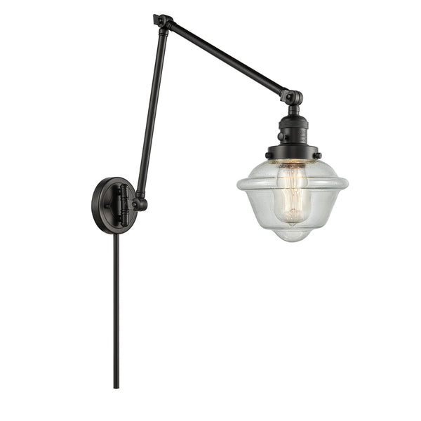 Oxford Swing Arm shown in the Matte Black finish with a Seedy shade
