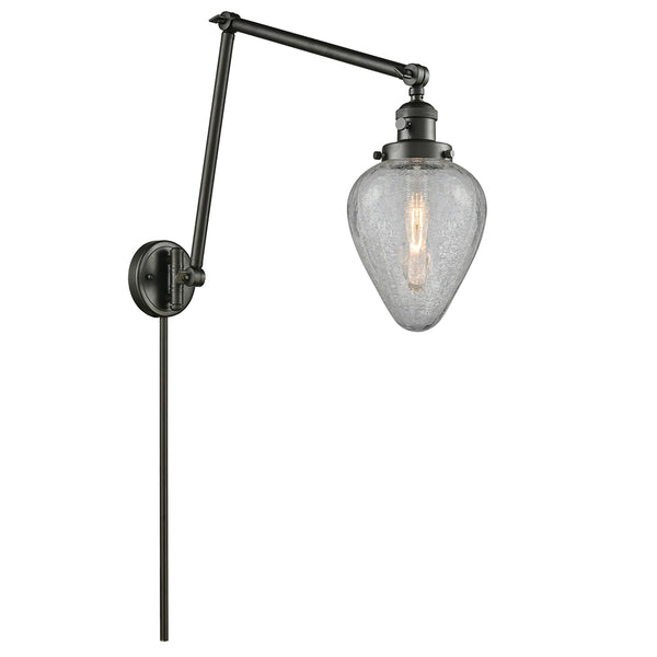 Geneseo Swing Arm shown in the Oil Rubbed Bronze finish with a Clear Crackled shade