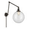 Beacon Swing Arm shown in the Oil Rubbed Bronze finish with a Clear shade