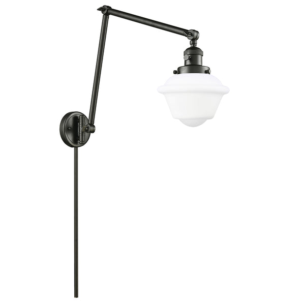 Oxford Swing Arm shown in the Oil Rubbed Bronze finish with a Matte White shade