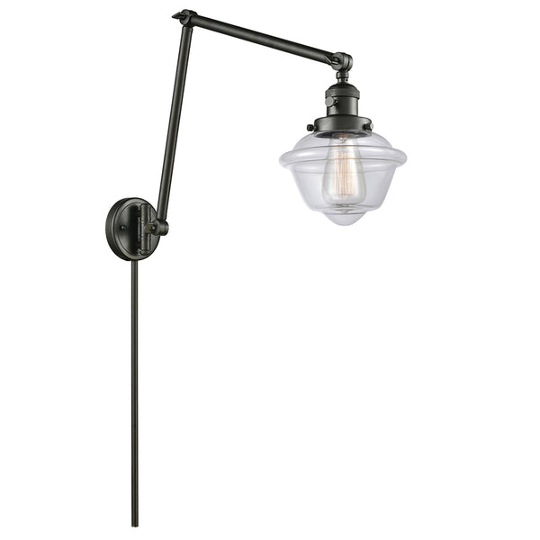 Oxford Swing Arm shown in the Oil Rubbed Bronze finish with a Clear shade