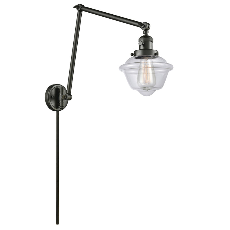 Oxford Swing Arm shown in the Oil Rubbed Bronze finish with a Clear shade