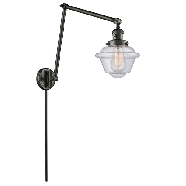 Oxford Swing Arm shown in the Oil Rubbed Bronze finish with a Seedy shade