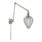 Geneseo Swing Arm shown in the Polished Nickel finish with a Clear Crackled shade