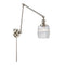 Colton Swing Arm shown in the Polished Nickel finish with a Clear Halophane shade