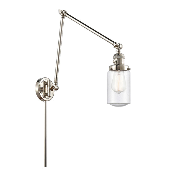Dover Swing Arm shown in the Polished Nickel finish with a Seedy shade
