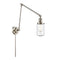 Dover Swing Arm shown in the Polished Nickel finish with a Seedy shade