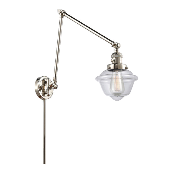 Oxford Swing Arm shown in the Polished Nickel finish with a Clear shade