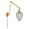 Geneseo Swing Arm shown in the Satin Gold finish with a Clear Crackled shade