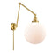 Beacon Swing Arm shown in the Satin Gold finish with a Matte White shade