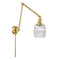Colton Swing Arm shown in the Satin Gold finish with a Clear Halophane shade
