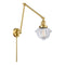 Oxford Swing Arm shown in the Satin Gold finish with a Clear shade