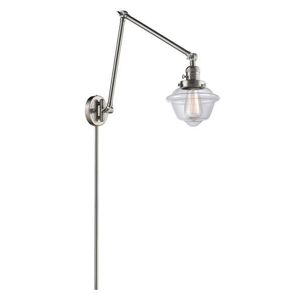 Oxford Swing Arm shown in the Brushed Satin Nickel finish with a Clear shade