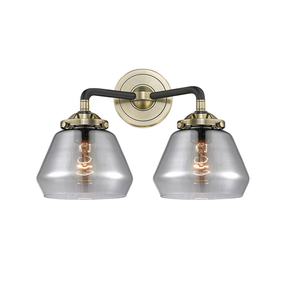 Fulton Bath Vanity Light shown in the Black Antique Brass finish with a Plated Smoke shade