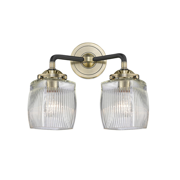 Colton Bath Vanity Light shown in the Black Antique Brass finish with a Clear Halophane shade