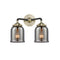 Bell Bath Vanity Light shown in the Black Antique Brass finish with a Plated Smoke shade