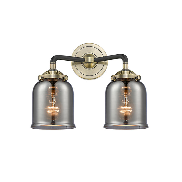 Bell Bath Vanity Light shown in the Black Antique Brass finish with a Plated Smoke shade