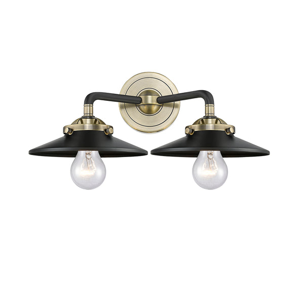 Railroad Bath Vanity Light shown in the Black Antique Brass finish with a Matte Black shade