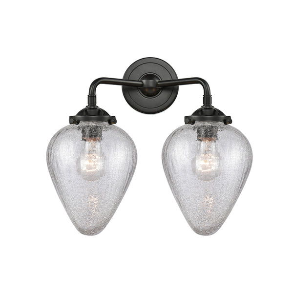 Geneseo Bath Vanity Light shown in the Oil Rubbed Bronze finish with a Clear Crackled shade
