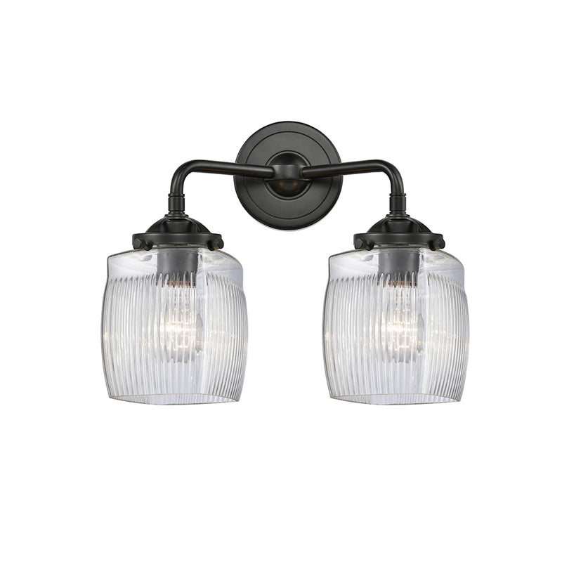 Colton Bath Vanity Light shown in the Oil Rubbed Bronze finish with a Clear Halophane shade