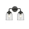 Bell Bath Vanity Light shown in the Oil Rubbed Bronze finish with a Clear shade