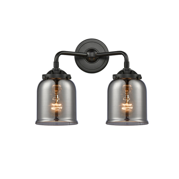 Bell Bath Vanity Light shown in the Oil Rubbed Bronze finish with a Plated Smoke shade