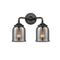 Bell Bath Vanity Light shown in the Oil Rubbed Bronze finish with a Plated Smoke shade