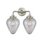 Geneseo Bath Vanity Light shown in the Brushed Satin Nickel finish with a Clear Crackled shade